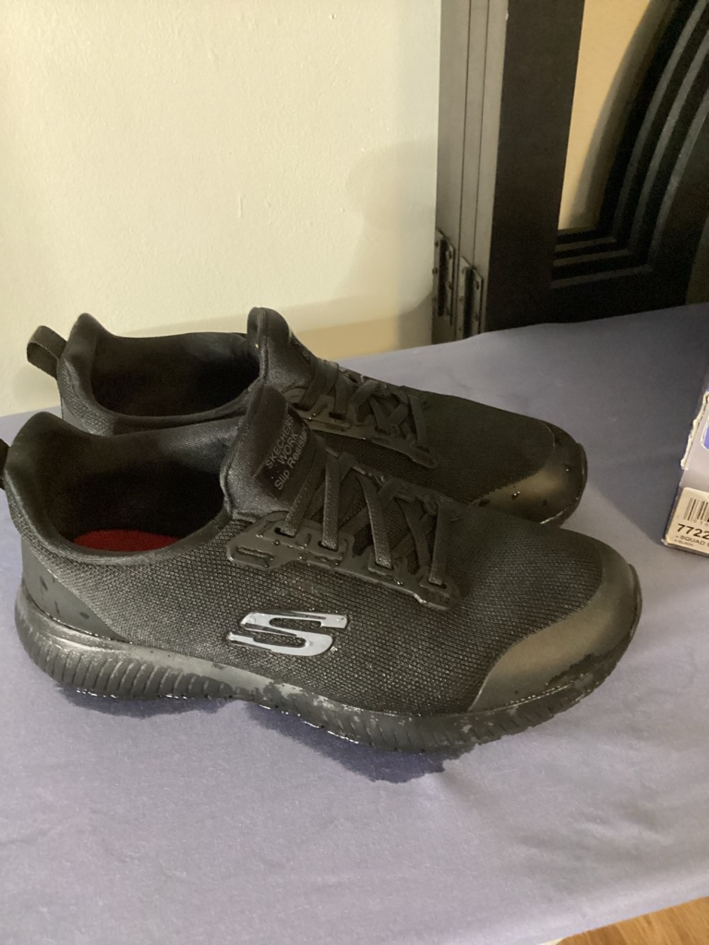 Skechers Women  Black Knit Sneakers with Silver Logo